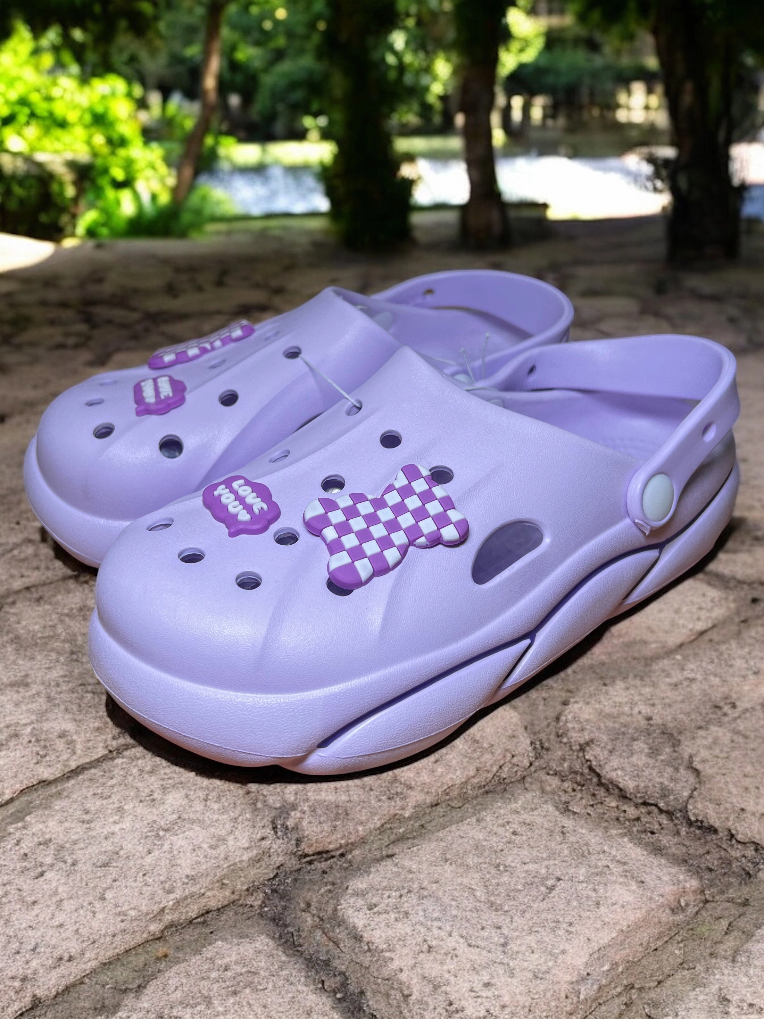 Trendy Slip-On Crocs with Checkerboard Charm and Love You Accent Boston Soft Bed Clogs